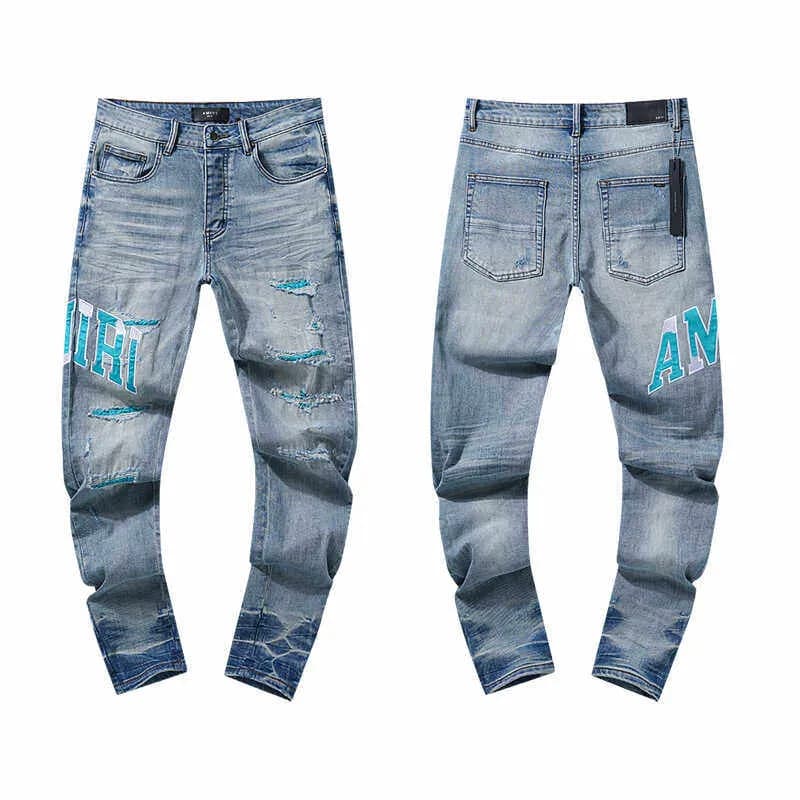 Distressed Logo Jeans AMIRI Script