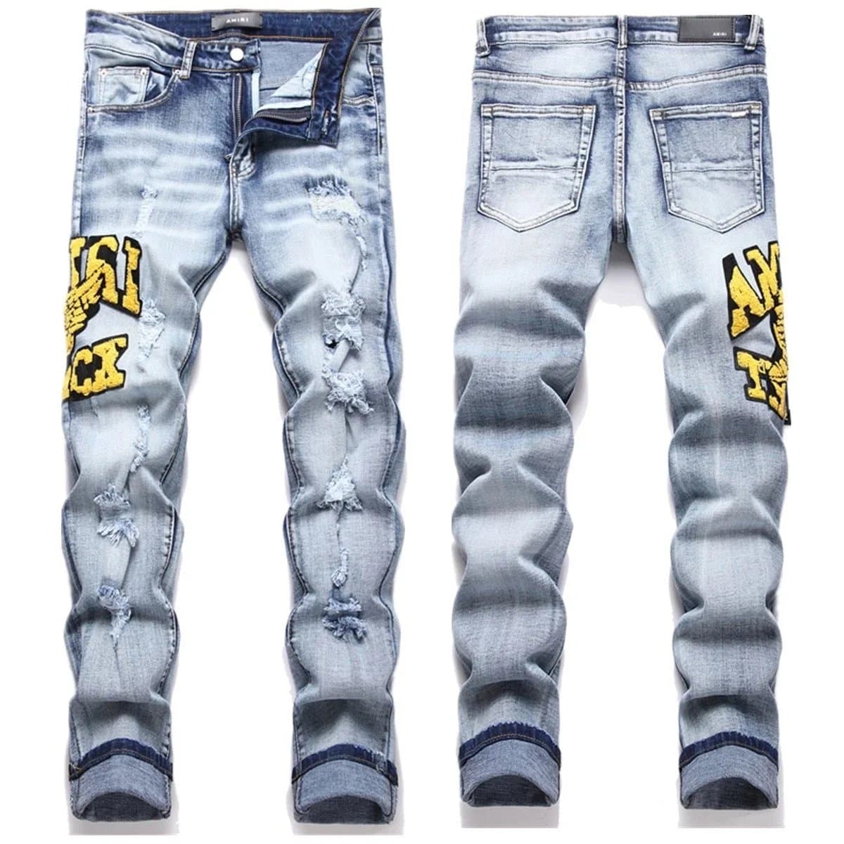 Amiri Distressed Jeans Yellow Logo Patch