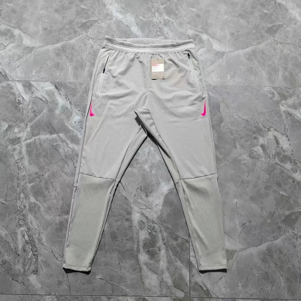 Nike Tech Fleece Joggers Light Grey with Pink Swoosh