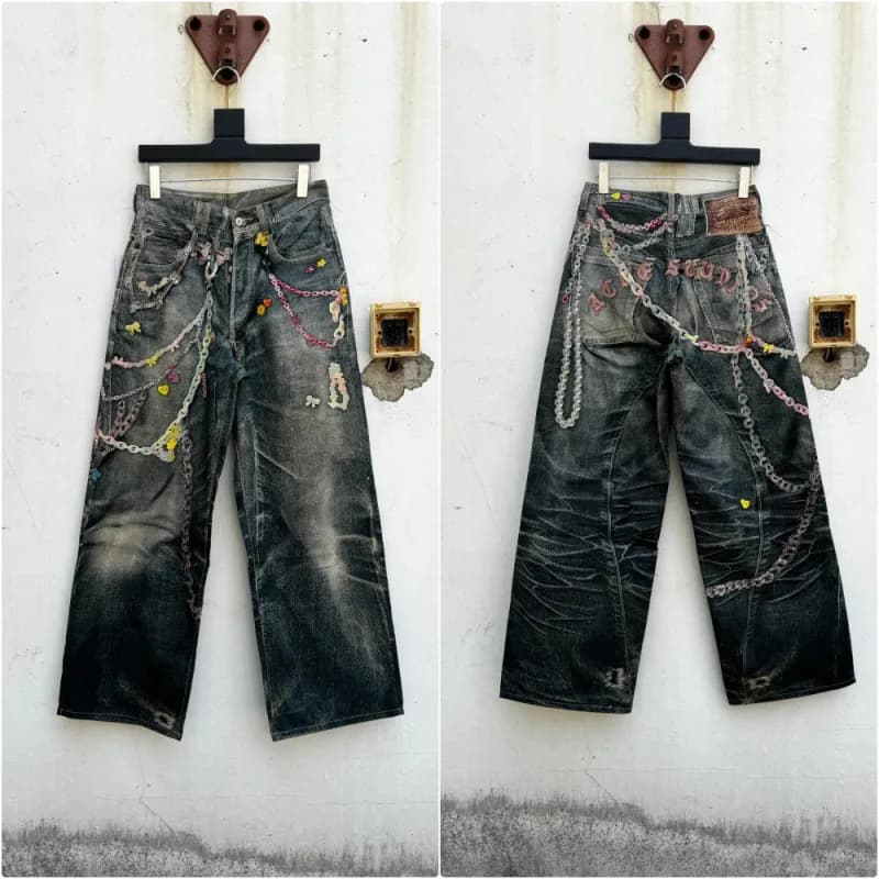 Denim Tears Chain-Embellished Jeans Distressed with Multi-Chain Appliqué