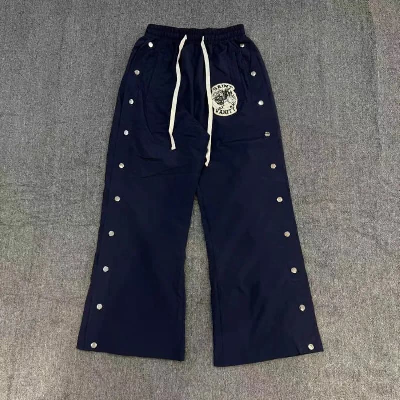 Saint Laurent Track Pants Studded Logo Patch — 80