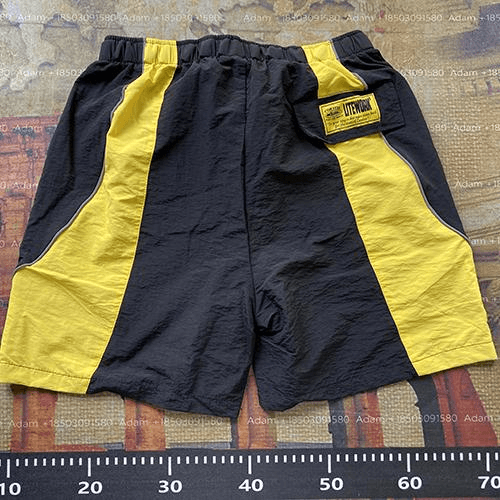 Corteiz Track Shorts Black Yellow Panel