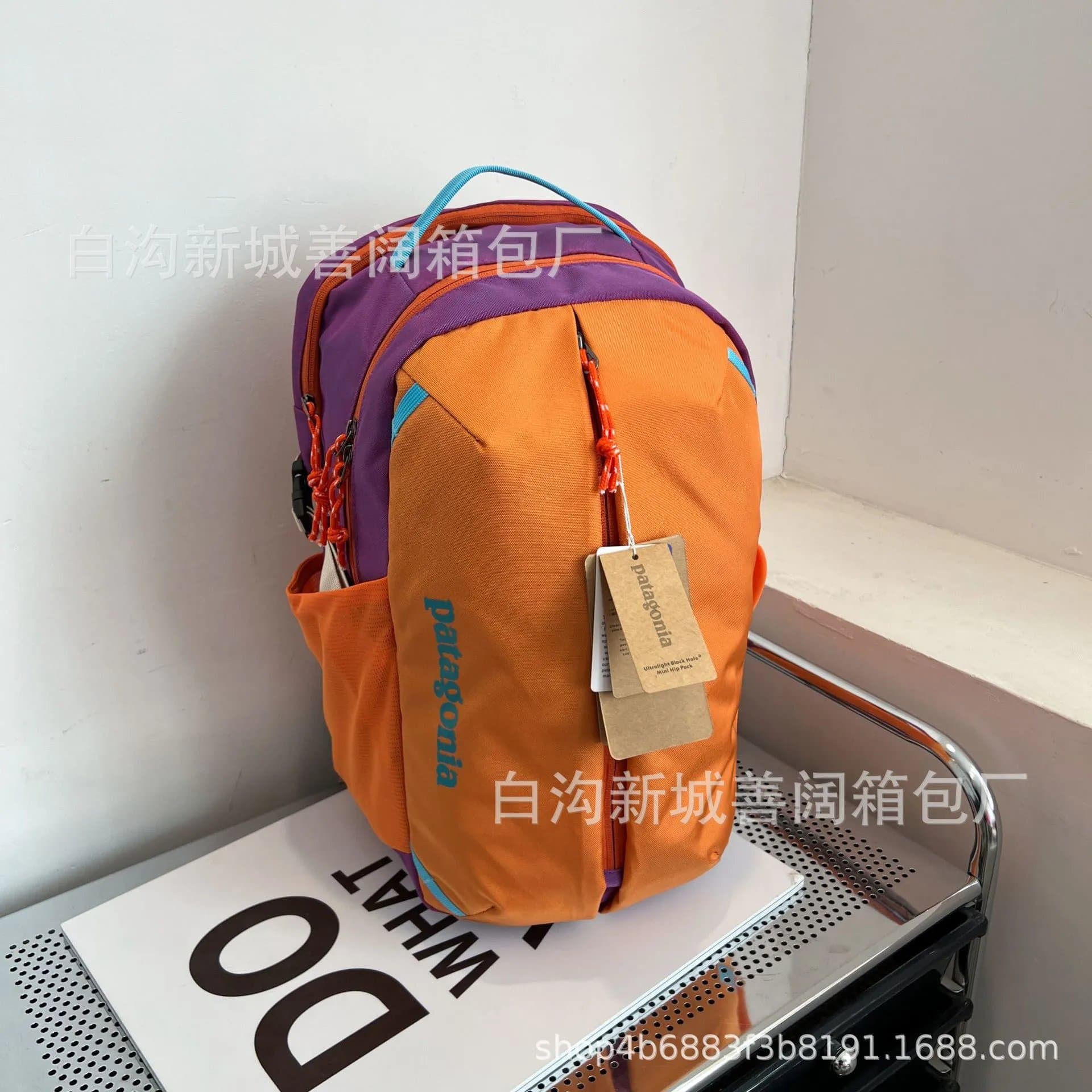 Patagonia Ultralight Black Hole Mini Hip Pack Orange/Purple