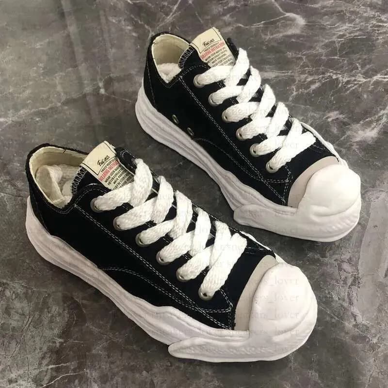 Comme des Garçons CDG Play Sneaker Distressed Sole