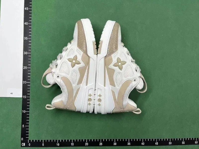 Louis Vuitton LV Trainer Leopard Studs — 30