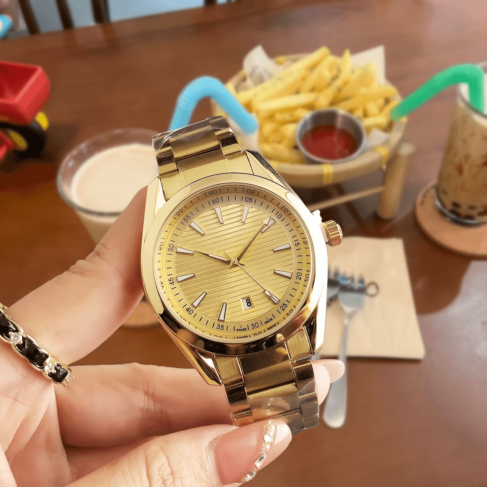 Rolex Oyster Perpetual Gold Dial