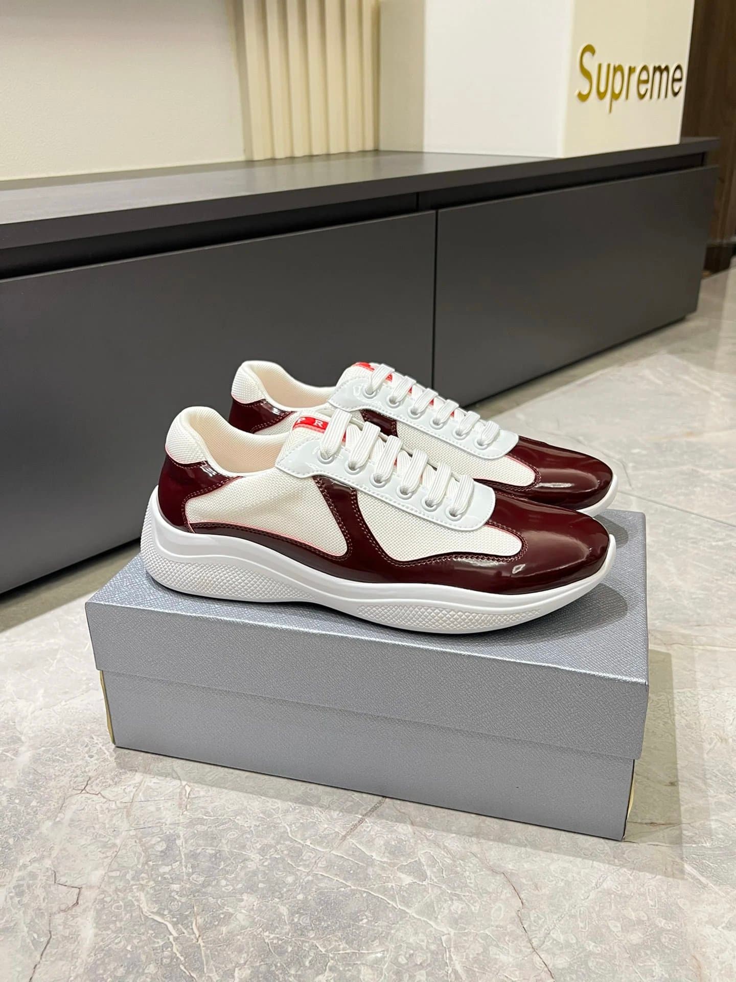 Prada × Supreme Cloudbust Thunder White Black Red — 05