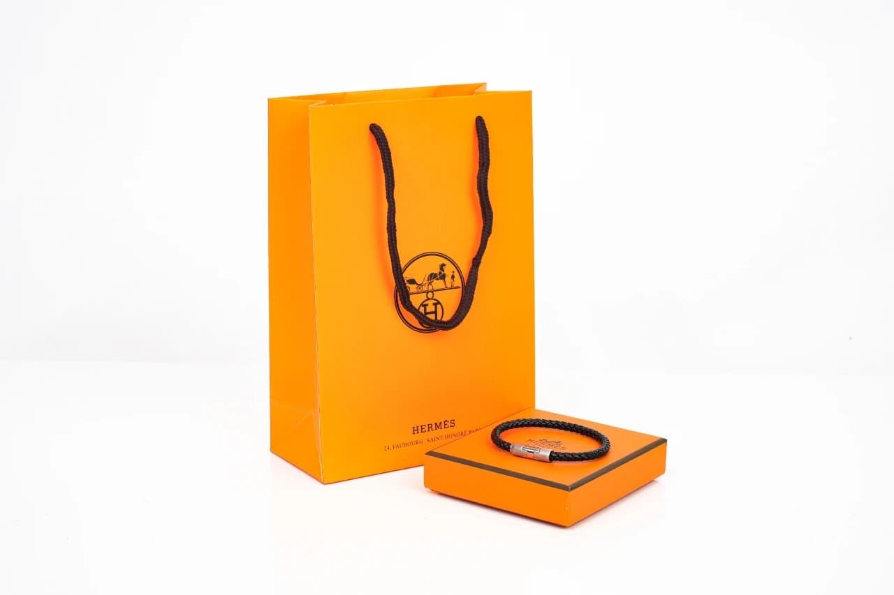 Hermès Braided Leather Bracelet Black Braided with Silver-Tone Clasp