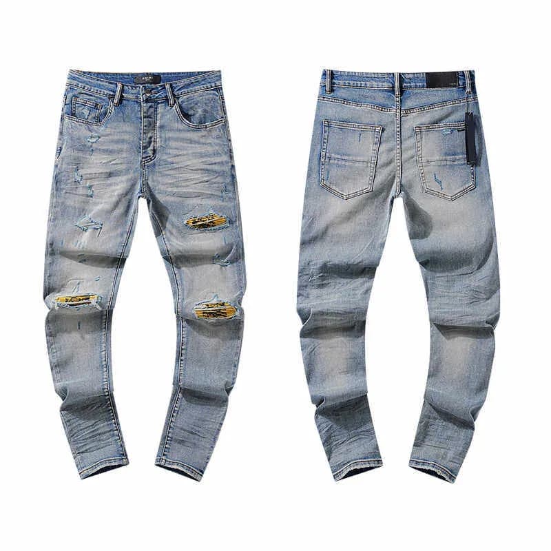Distressed Slim Fit Jeans Light Wash with Patch Repair