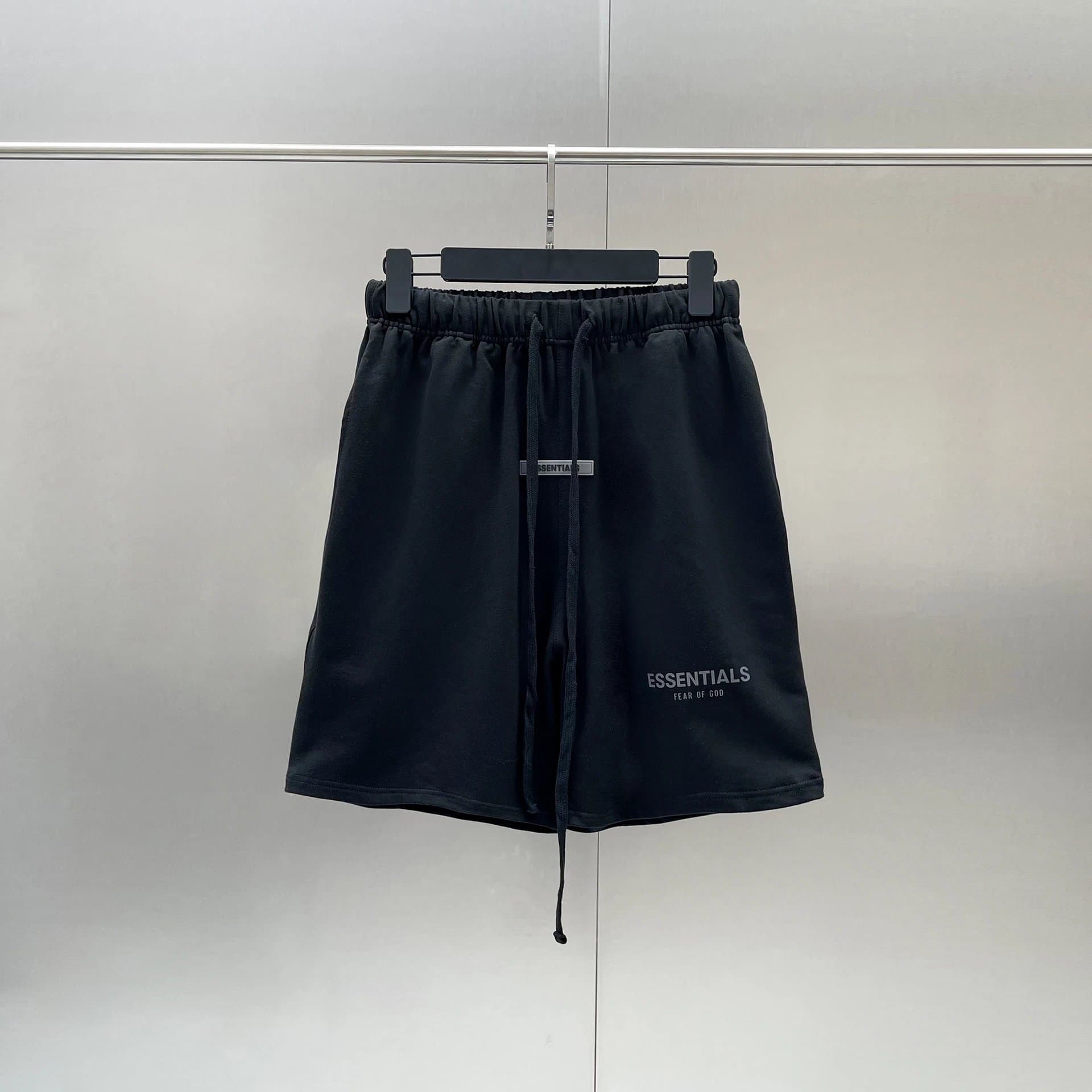 Prada Triangle Logo Shorts White with Black Triangle Patch — ess3