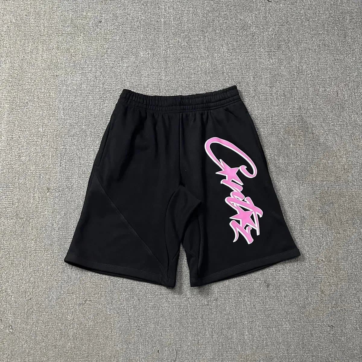 Travis Scott Graphic Shorts Pink Script Logo