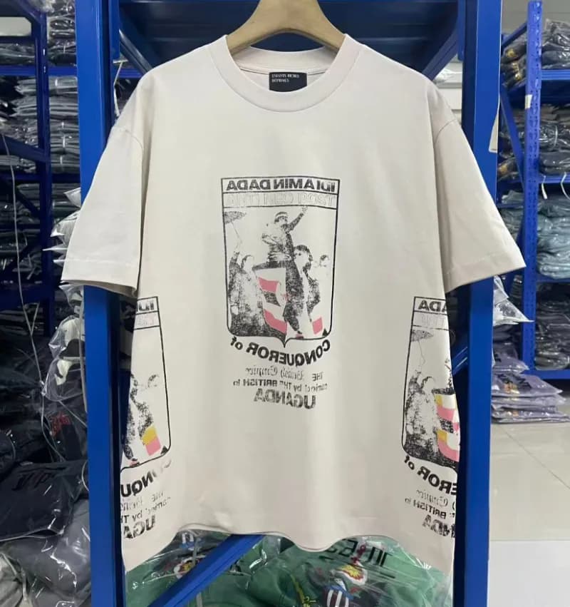 Fear of God Essentials Graphic Tee Conqueror of Uganda Print