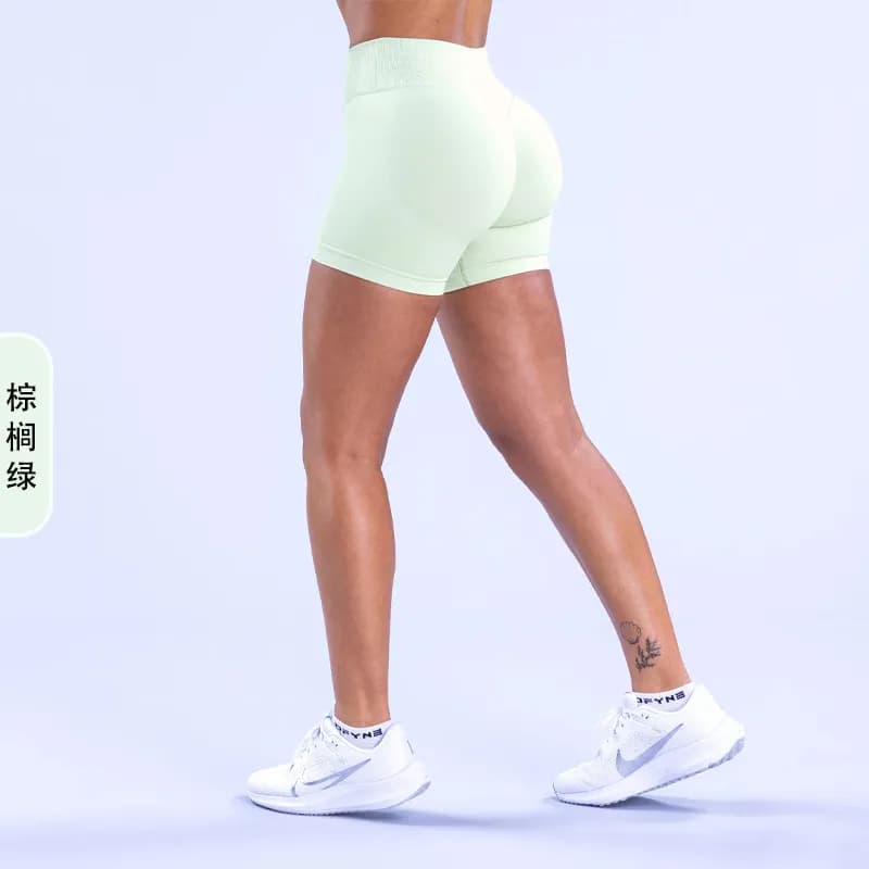 SKIMS High-Waisted Biker Shorts Vibrant Orange — 棕榈绿