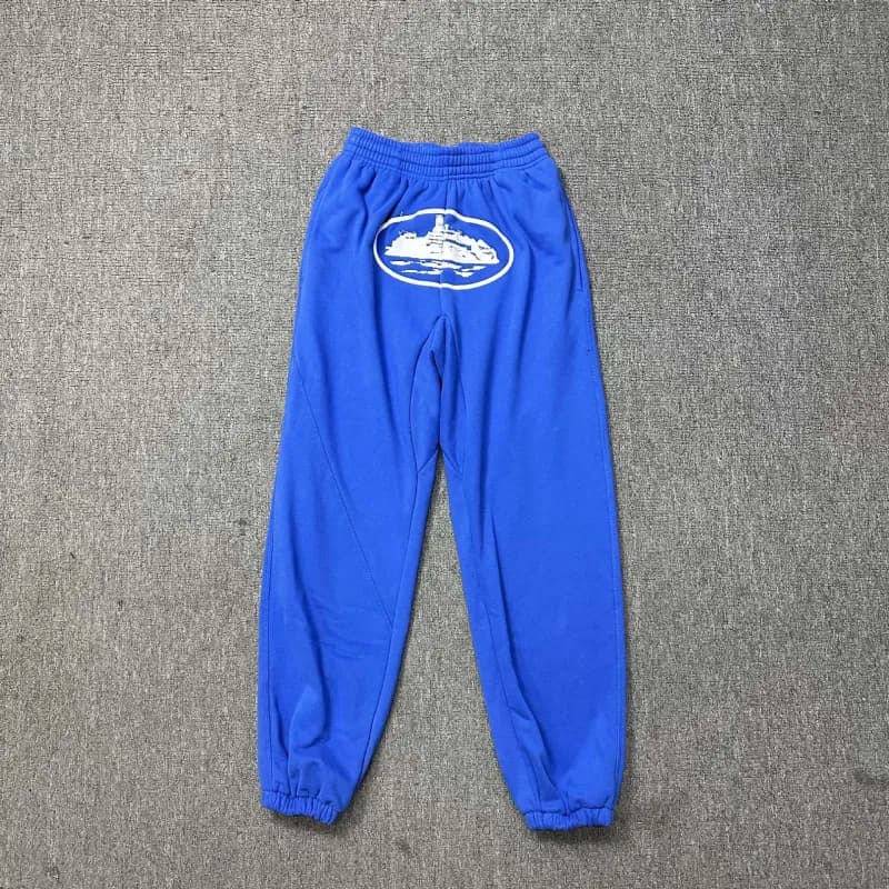 Fear of God Essentials Jogger Pants Script Logo — Colorful blue trousers