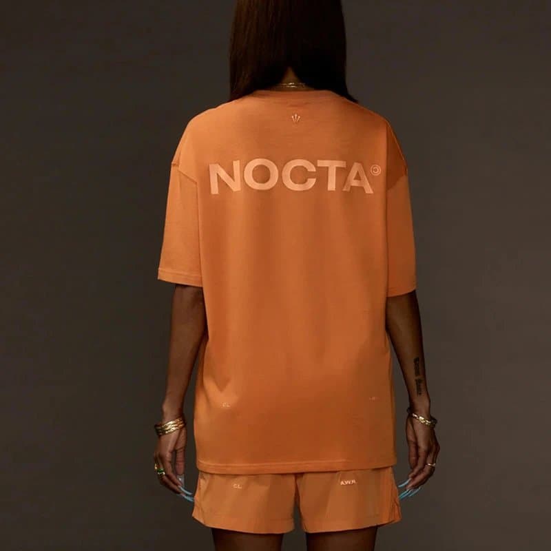Broken Planet Logo Tee NOCTA Print — 橙色