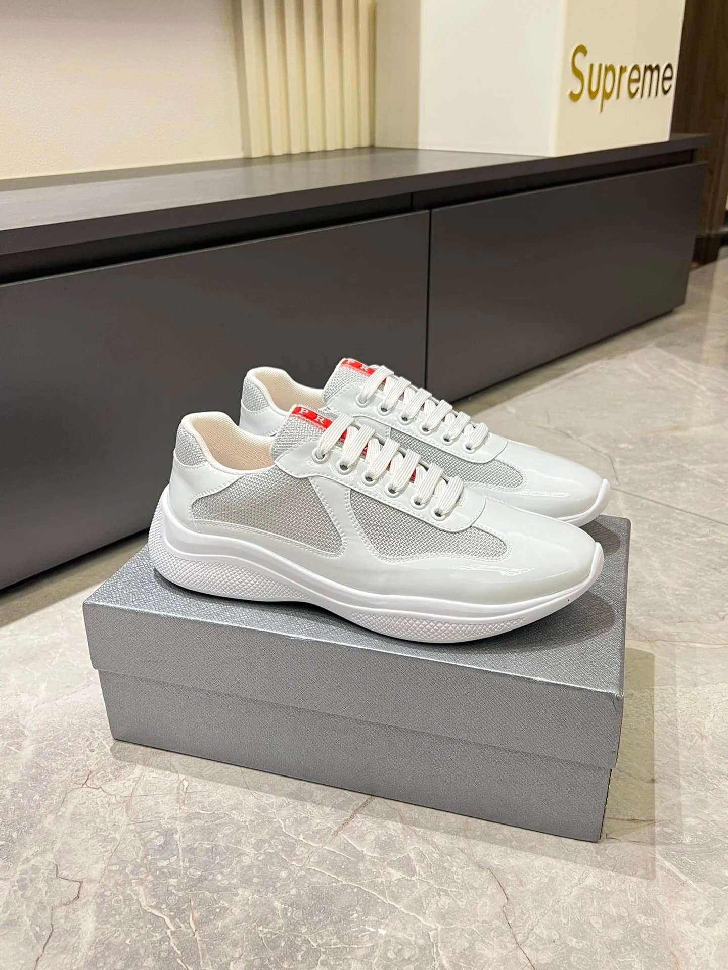 Prada × Supreme Cloudbust Thunder White Black Red — 20