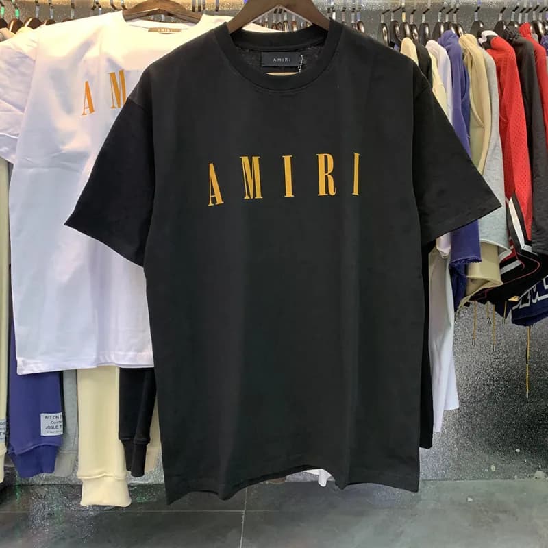 Amiri Graphic Tee Signature Script — 901 black printed orange