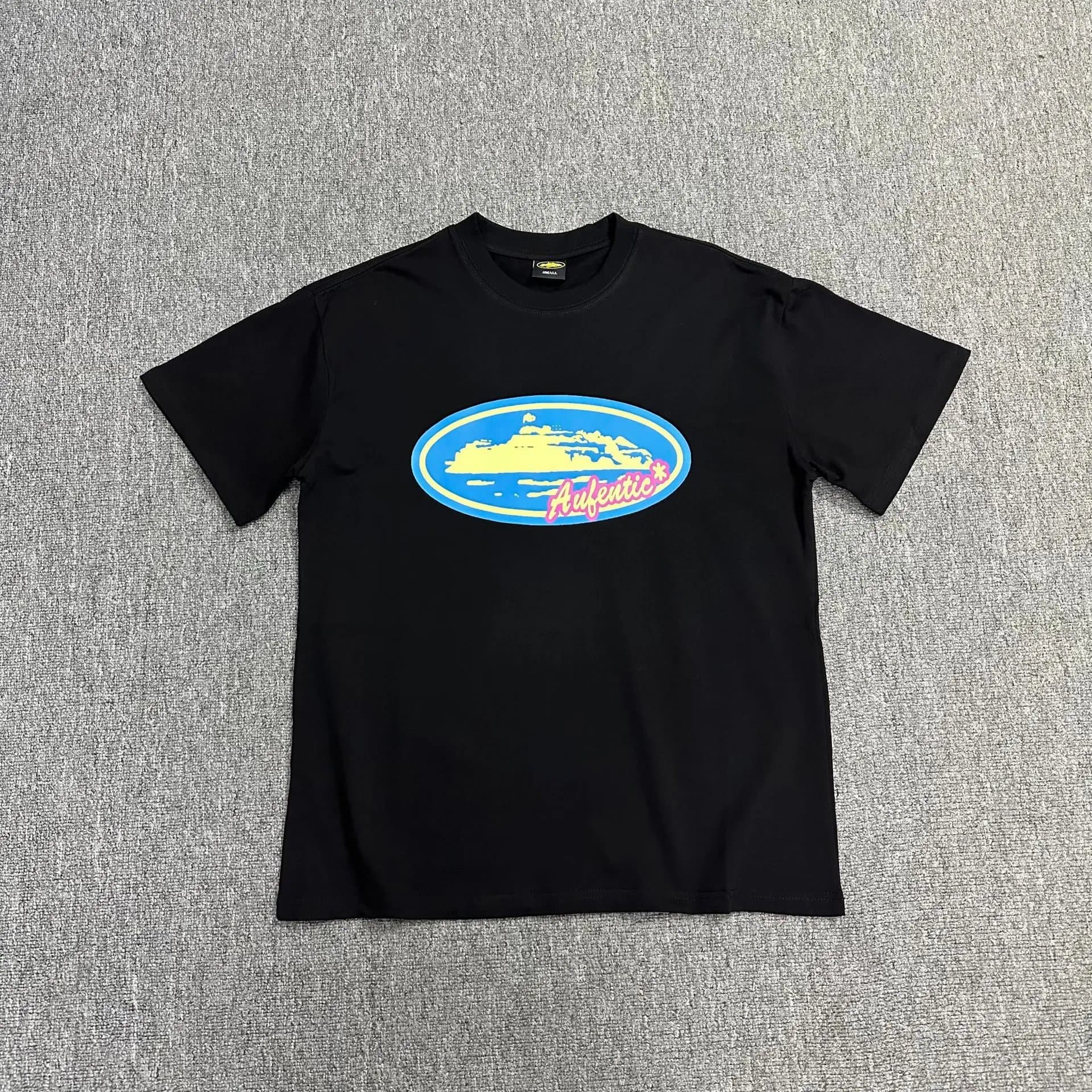 Corteiz Graphic Tee Rules the Waves — 3153 Black Seal Light Blue