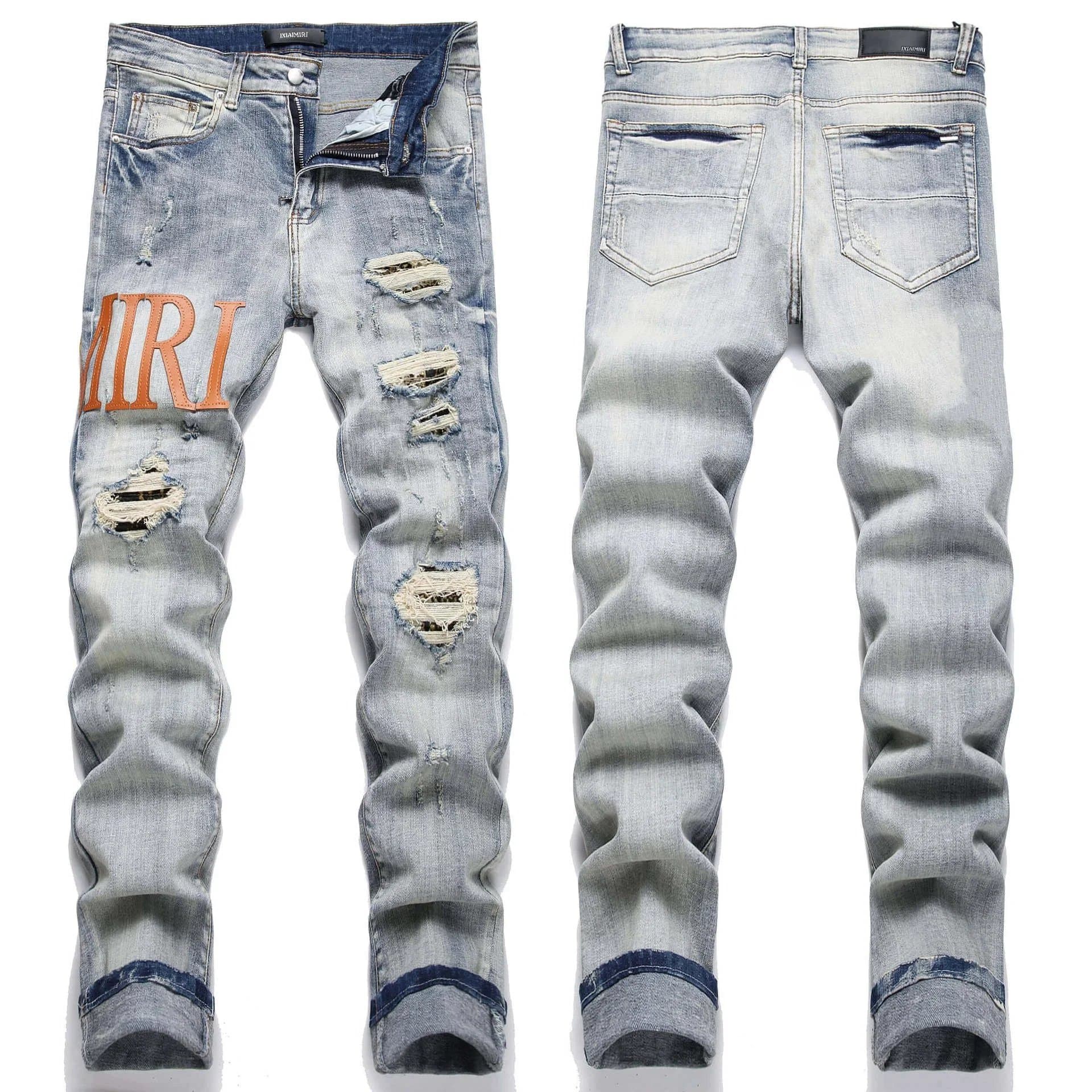 Amiri Distressed Patchwork Jeans Eagle & Logo Patch — 28