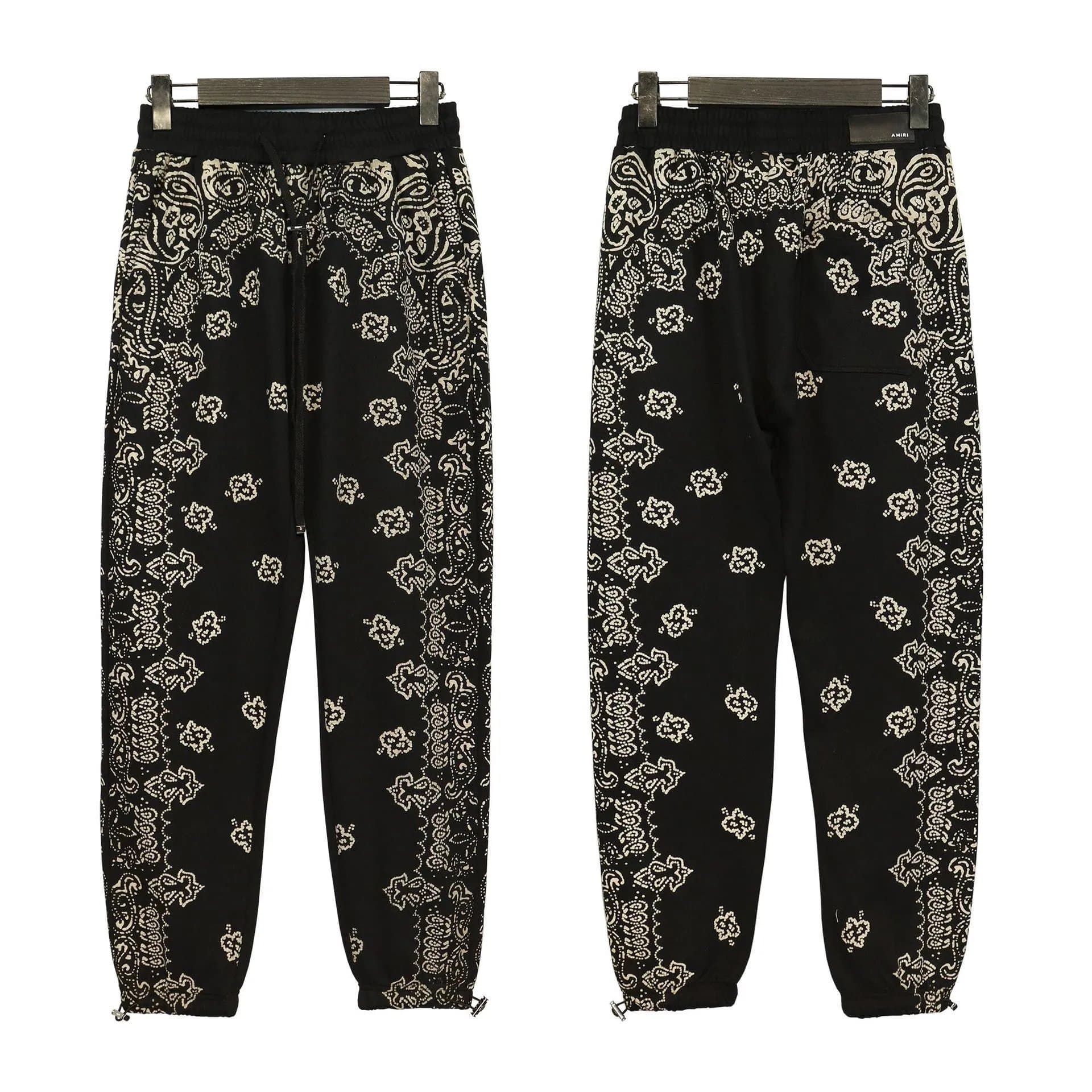 Amiri Logo Joggers Dripping Paint — 23