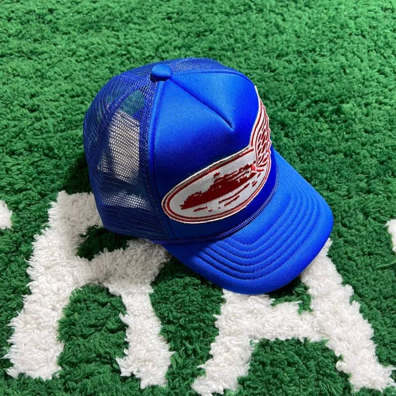 New Era Trucker Cap Winged Logo Patch