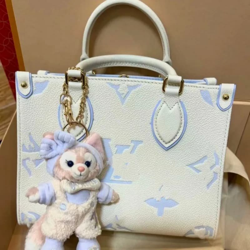 Louis Vuitton Pochette Métis Monogram Empreinte with Disney Charm