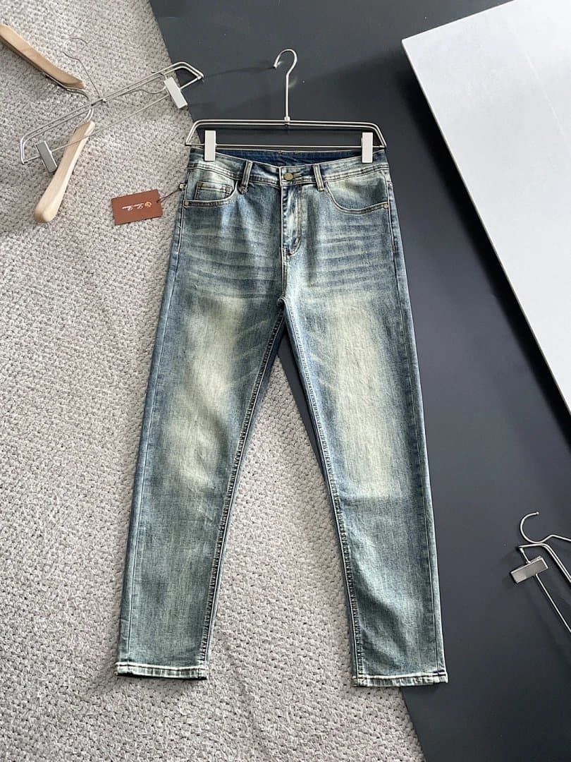 Prada Flared Jeans Embroidered Logo — 77