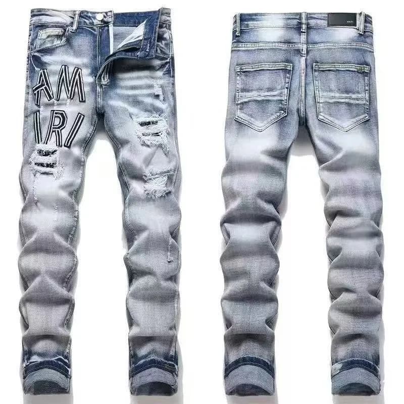 Amiri Distressed Patchwork Jeans Multi-Patch — M12