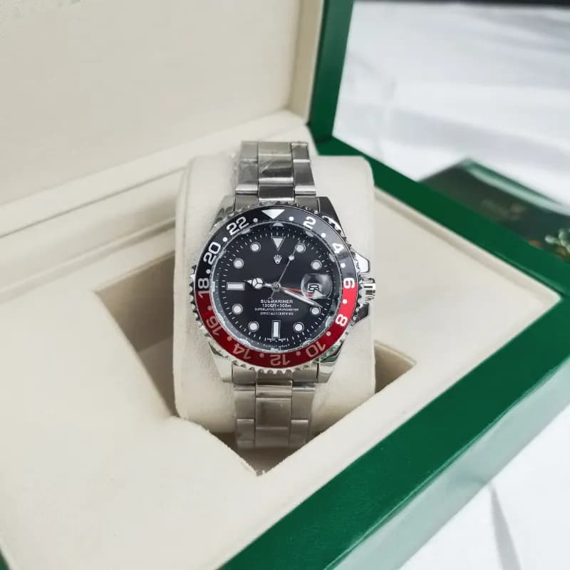 Rolex Submariner Blue Dial with Gold Bezel — Four-pin coke circle, three silver, black and red circles, black surface