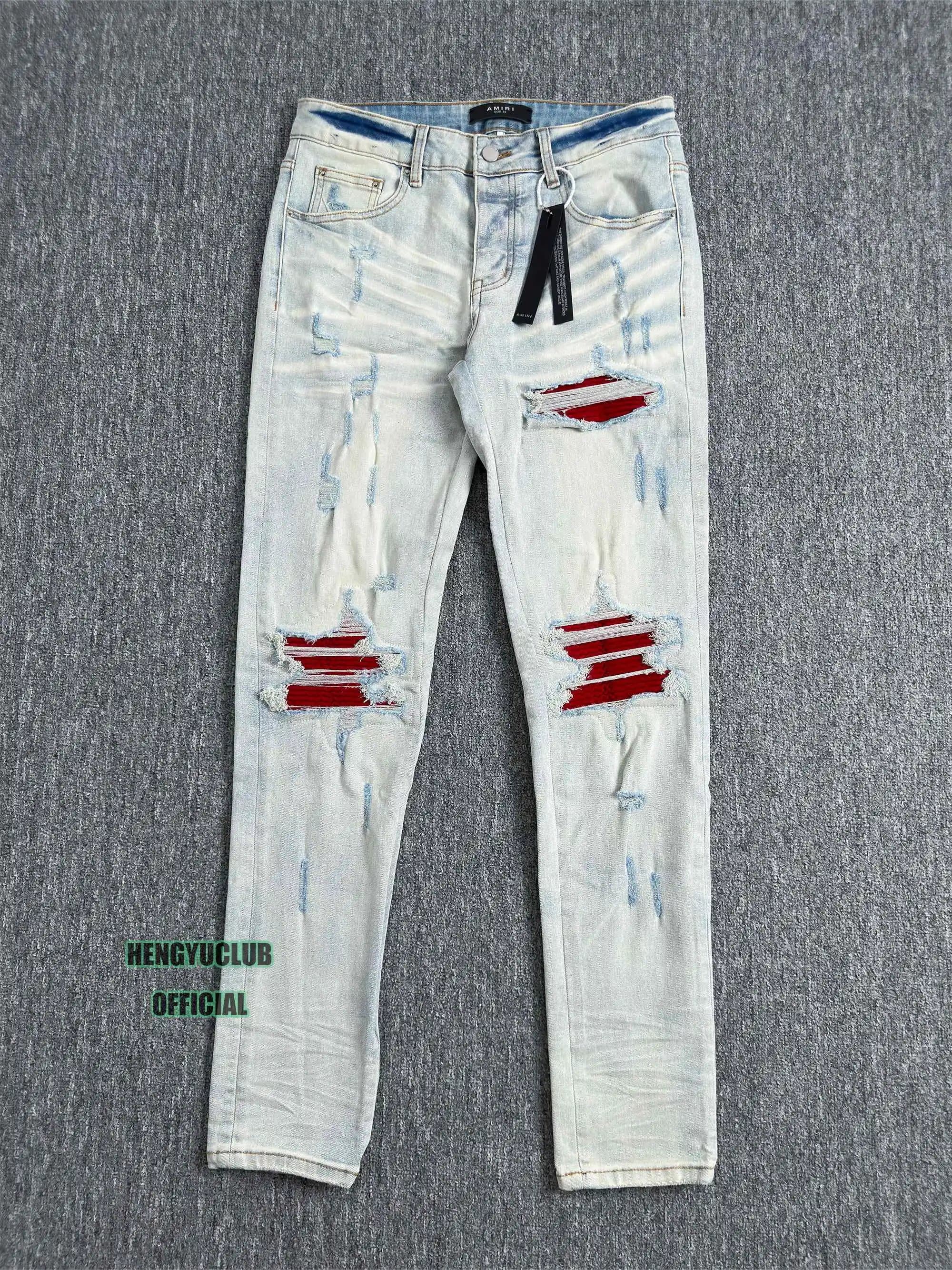Amiri Distressed Slim Fit Jeans Red Stripe Patch