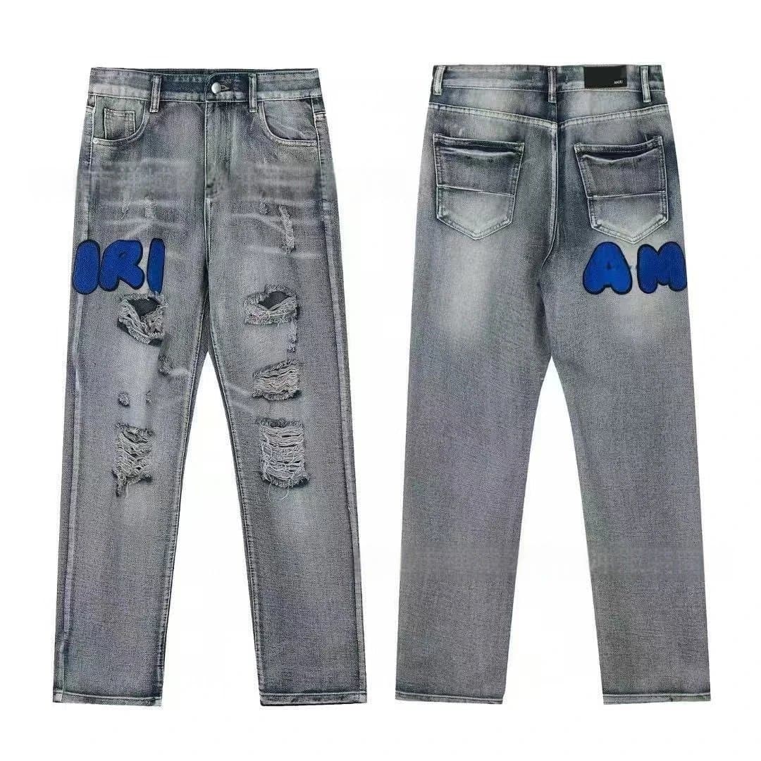Amiri Distressed Jeans Blue Logo Patch