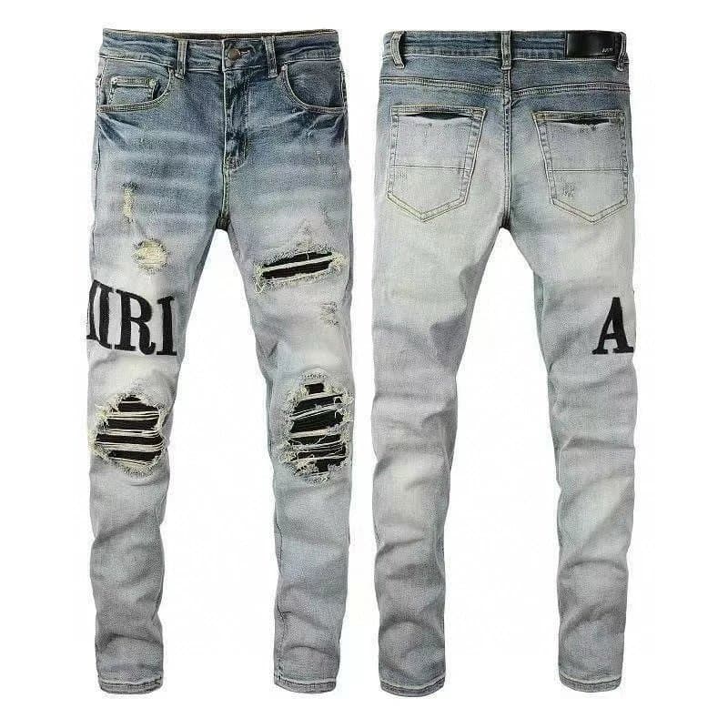 Amiri Distressed Jeans IRIAM Logo Patch — M69