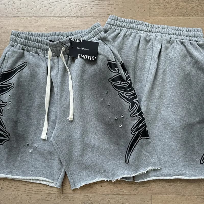 Mixed Emotion Distressed Graphic Shorts Wing Print