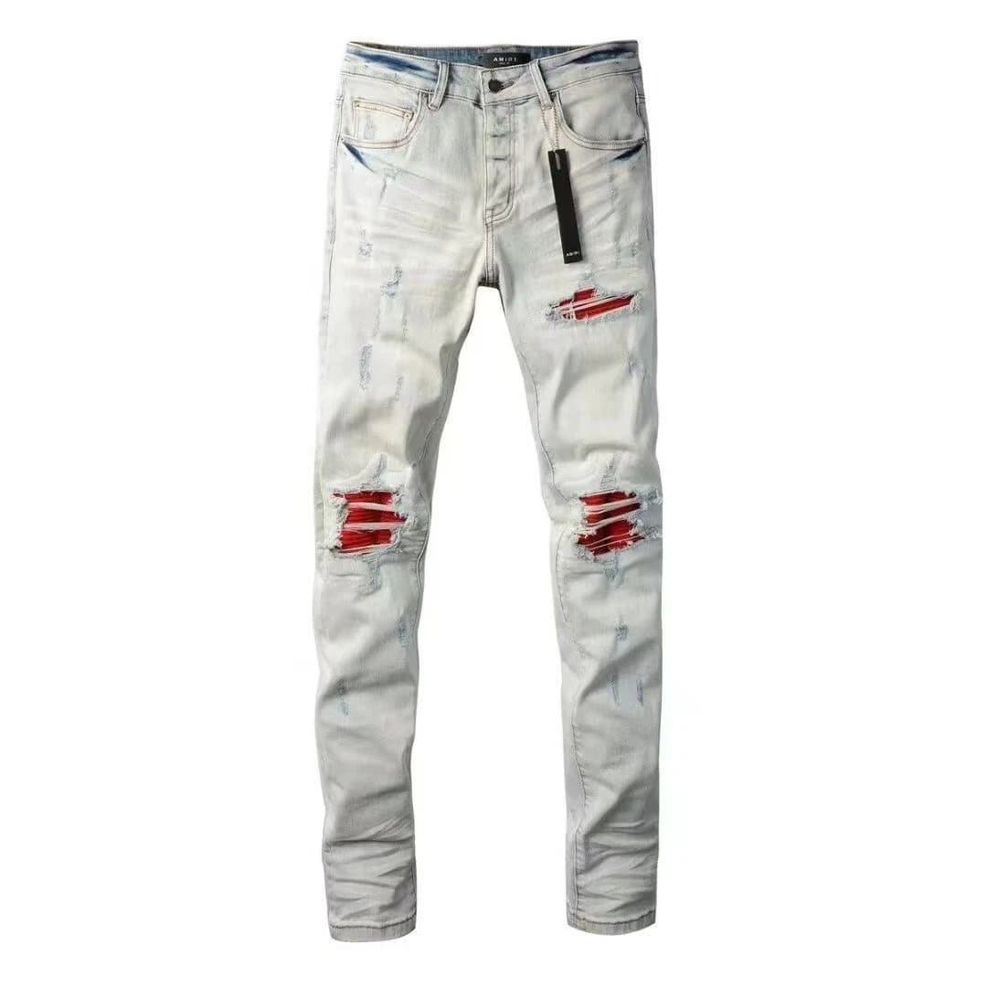 Amiri Distressed Logo Jeans Cow Print Patch — 15