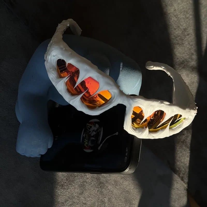Gentle Monster Sculptural Eyewear Figure Melted Frame with Reflective Lenses