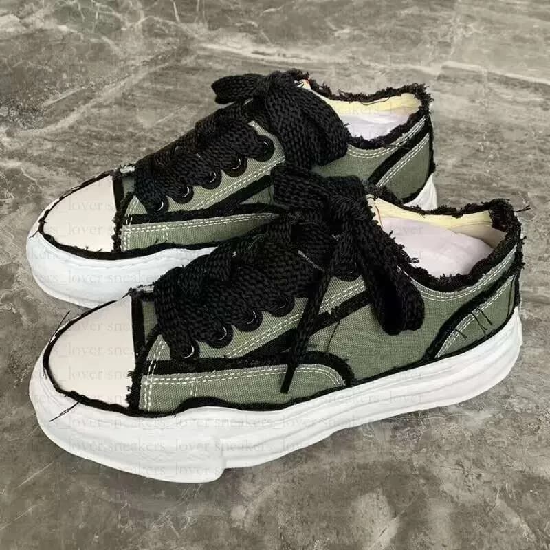 Comme des Garçons CDG Play Sneaker Olive Canvas with Distressed Trim