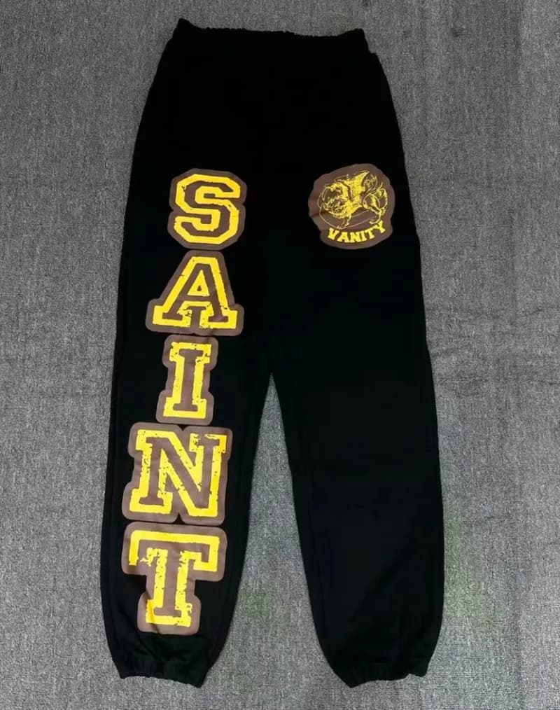 Saint Laurent Track Pants Studded Logo Patch — 90
