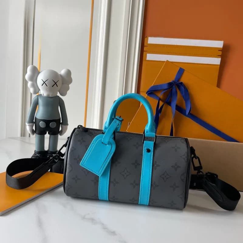 Louis Vuitton × KAWS Keepall Bandoulière Monogram Eclipse with Turquoise Accents
