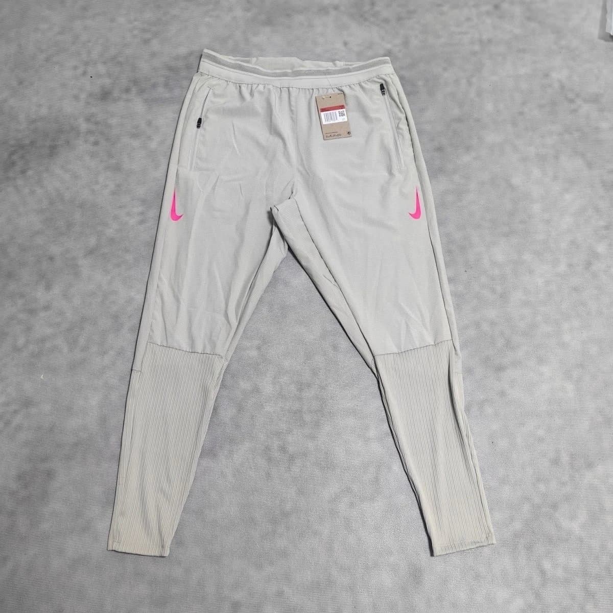 Nike Tech Knit Pants Light Grey with Pink Swoosh