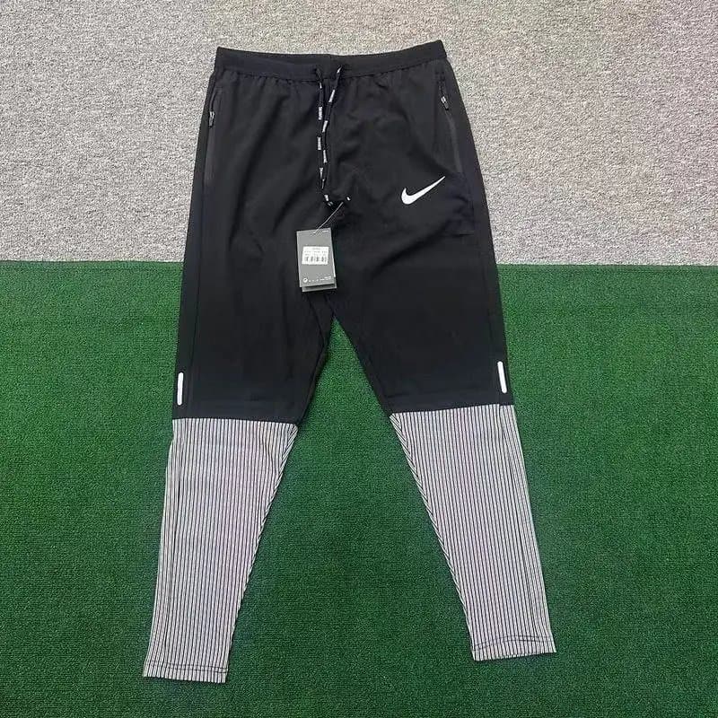 Nike Quarter-Zip Top Grid Print — 25