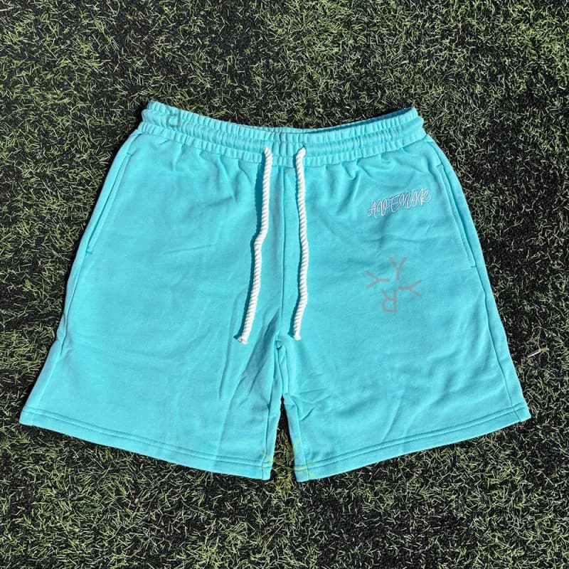 Travis Scott × Fear of God Essentials Cactus Jack Shorts Aqua with Embroidered Logo