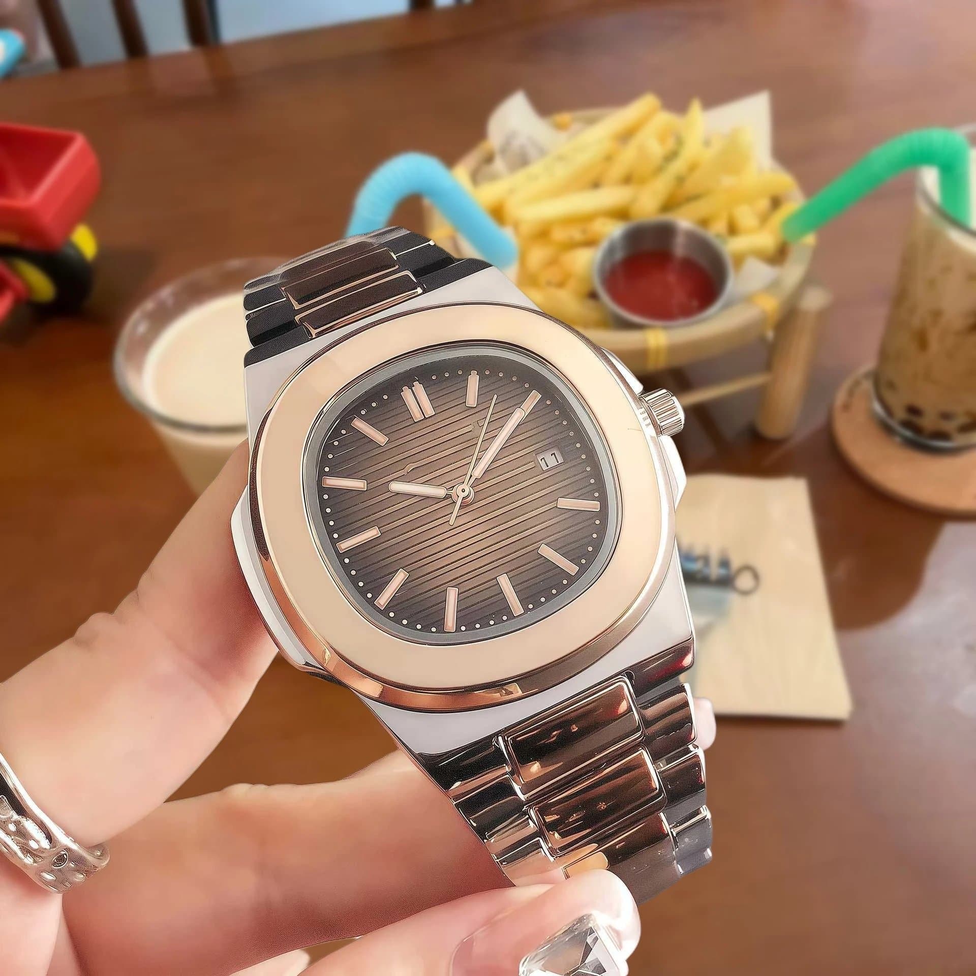 Patek Philippe Nautilus Oval Case with Horizontal Lines Dial