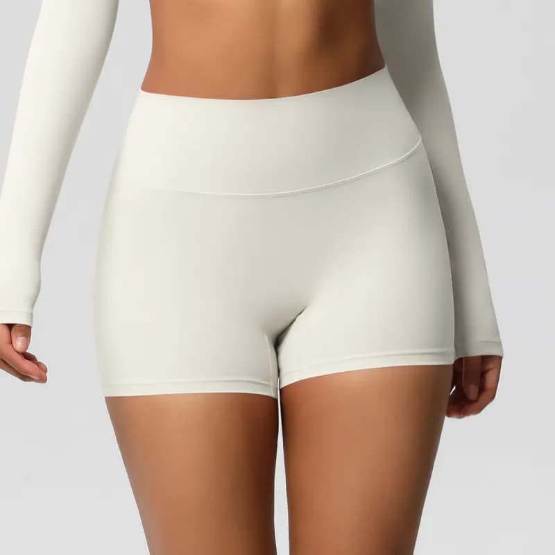 SKIMS Long Sleeve Crop Top Seamless — 7101 shorts-light ivory