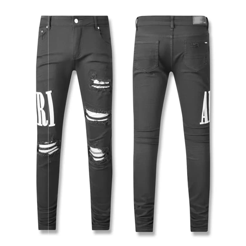 Amiri Distressed Logo Jeans Ripped with White Lettering