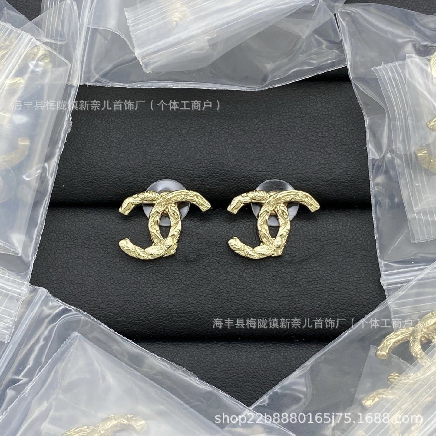 Chanel CC Logo Stud Earrings Leaf-Embossed