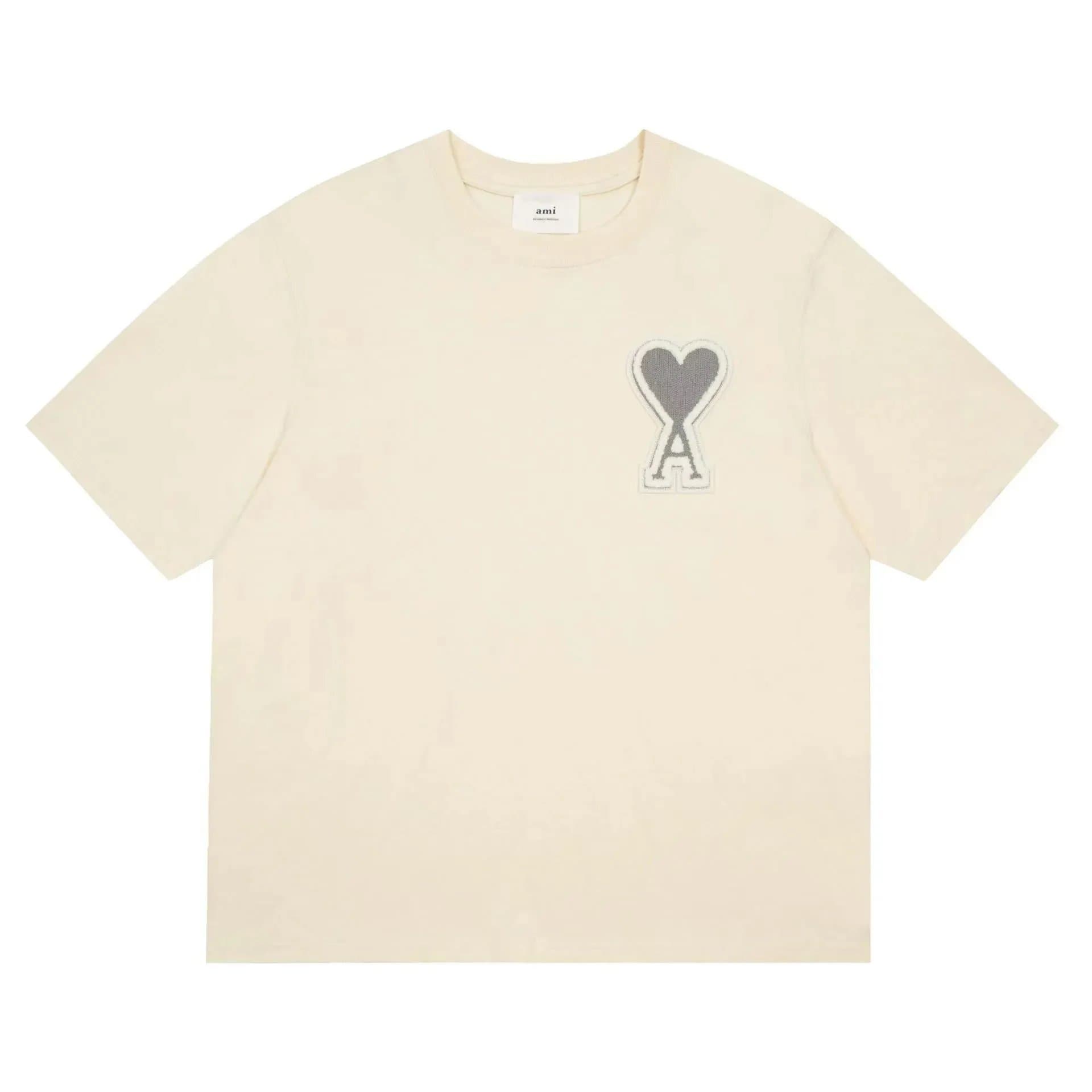 AMI Paris Heart Logo T-Shirt Black Heart Patch — 淺黃