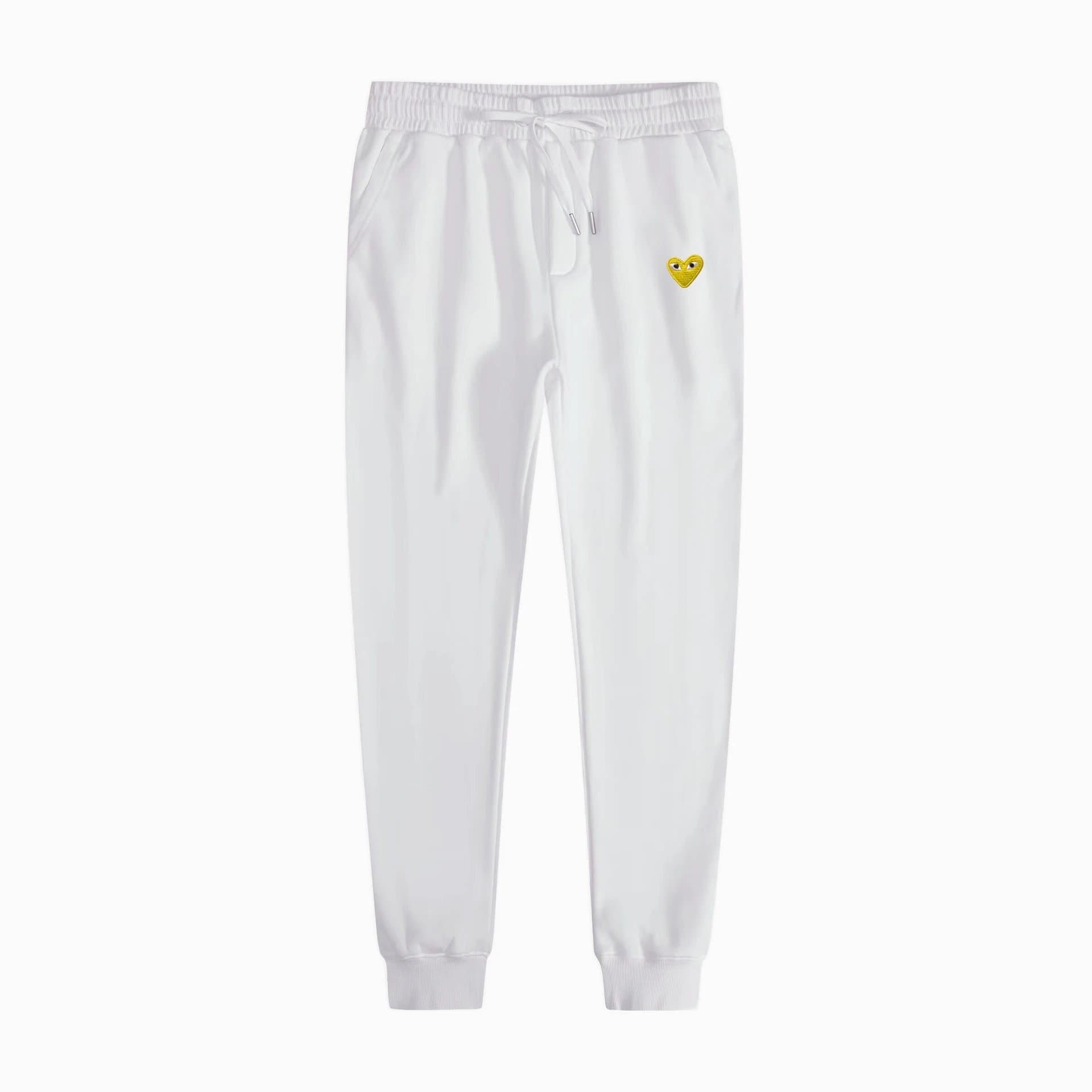 Comme des Garçons Jogger Pants Heart Logo — 卫裤白色金眼